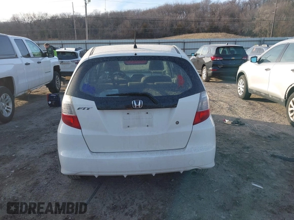 2009 Honda Fit z VIN JHMGE88249S067463, wystawiony jako IAAI lot #41354698 z przebiegiem 153 402 mil mil oraz . Historia ofert i sprzedaży dostępna na DreamBid. Obrazek 16.