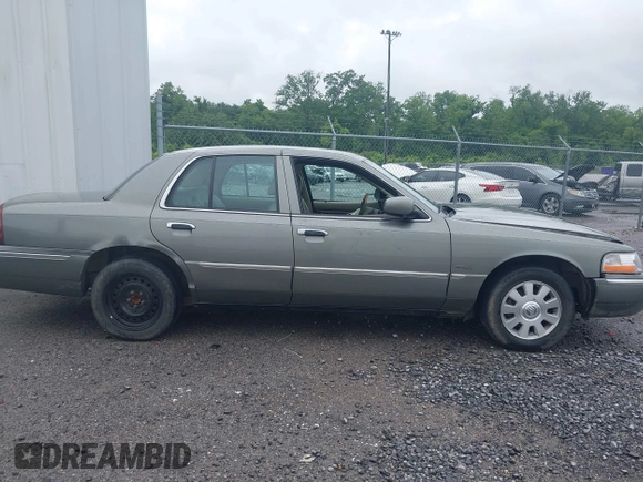 2004 Mercury Grand Marquis LS Premium z VIN 2MEHM75W64X654827, wystawiony jako IAAI lot #41890046 z przebiegiem Nie podano mil oraz . Historia ofert i sprzedaży dostępna na DreamBid. Obrazek 13.