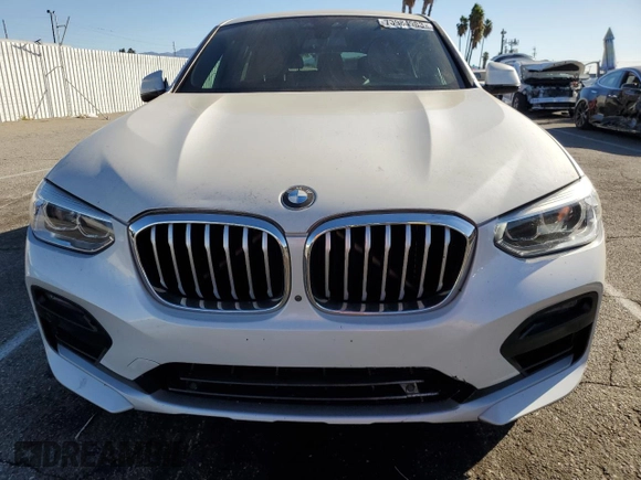 2020 BMW X4 xDrive30i with VIN 5UX2V1C09L9B97540, listed as a Copart auction lot 73984983 with 64,343 mi miles. Bid and sale history available at carsss.com. Image 5.