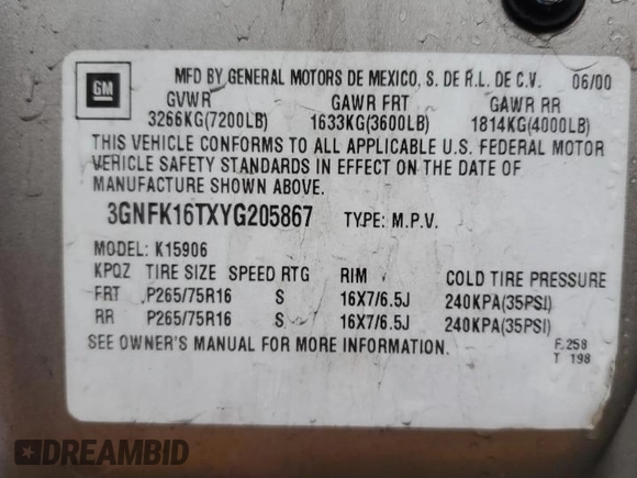 2000 Chevrolet Suburban LS with VIN 3GNFK16TXYG205867, listed as a Copart auction lot 87032424 with 307,632 mi miles and Salvage title. Bid and sale history available at DreamBid. Image 13.