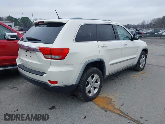 2011 Jeep Grand Cherokee Laredo with VIN 1J4RS4GG2BC709861, listed as a IAAI auction lot 41570812 with 178,226 mi miles and . Bid and sale history available at DreamBid. Image 4.