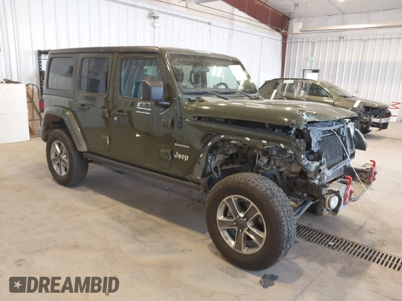 2021 Jeep Wrangler Unlimited Sahara z VIN 1C4HJXEN2MW592565, wystawiony jako IAAI lot #41956072 z przebiegiem 95 504 mil mil oraz . Historia ofert i sprzedaży dostępna na DreamBid. Obrazek 1.
