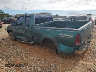 1997 Ford F-150 XL with VIN 1FTDX1869VKB05501, listed as a Copart auction lot 88164845 with 146,840 mi miles and Salvage Title. Bid and sale history available at carsss.com. Image 2.