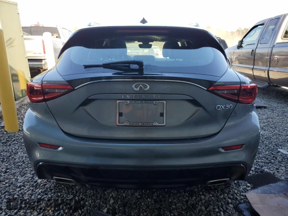 2019 Infiniti QX30 Essential with VIN SJKCH5CP1KA009263, listed as a Copart auction lot 86237614 with 47,887 mi miles and Salvage title. Bid and sale history available at DreamBid. Image 6.