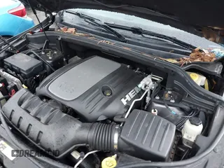 2014 Jeep Grand Cherokee Overland with VIN 1C4RJFCT2EC146239, listed as a IAAI auction lot 41368514 with 164,239 mi miles. Bid and sale history available at carsss.com. Image 10.