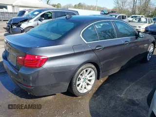 2015 BMW 5 Series 535i xDrive with VIN WBA5B3C55FD540905, listed as a IAAI auction lot 41892885 with 103,598 mi miles. Bid and sale history available at carsss.com. Image 4.