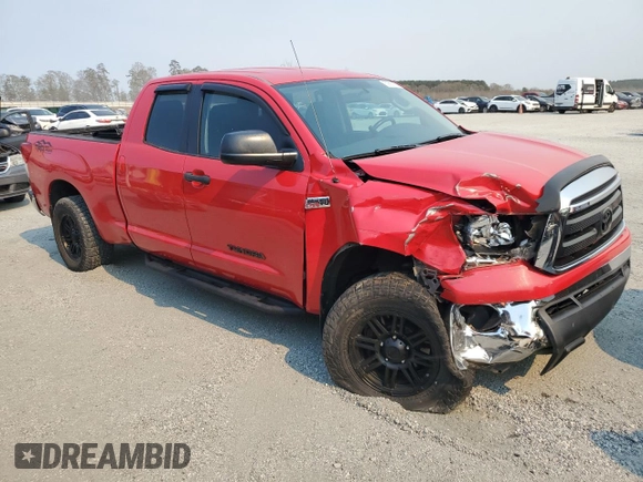 2011 Toyota Tundra 4WD Truck with VIN 5TFUW5F18BX177662, listed as a Copart auction lot 50690675 with 124,369 mi miles and Salvage Title. Bid and sale history available at carsss.com. Image 4.