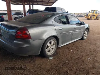 2005 Pontiac Grand Prix z VIN 2G2WP522651274708, wystawiony jako IAAI lot #41360656 z przebiegiem 170 799 mil mil oraz . Historia ofert i sprzedaży dostępna na DreamBid. Obrazek 4.