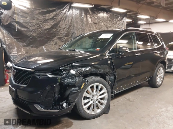2020 Cadillac XT6 AWD Premium Luxury with VIN 1GYKPDRSXLZ111021, listed as a IAAI auction lot 37922511 with 54,755 mi miles and . Bid and sale history available at DreamBid. Image 6.