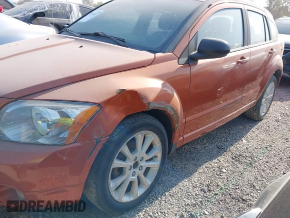 2011 Dodge Caliber Heat with VIN 1B3CB5HA1BD261958, listed as a IAAI auction lot 40570857 with 141,176 mi miles and . Bid and sale history available at DreamBid. Image 6.
