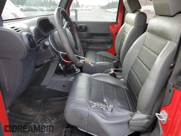2009 Jeep Wrangler X with VIN 1J4FA24149L760959, listed as a Copart auction lot 49425955 with 128,813 mi miles and Salvage Title. Bid and sale history available at DreamBid. Image 7.