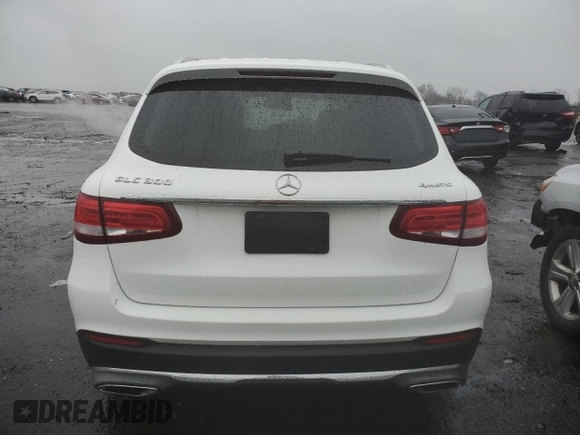 2019 Mercedes-Benz GLC with VIN WDC0G4KB4KV131837, listed as a Copart auction lot 70310052 with 64,571 mi miles. Bid and sale history available at carsss.com. Image 6.