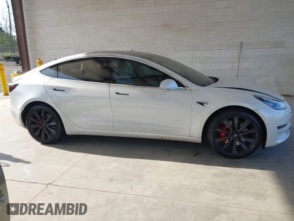 2020 Tesla Model 3 Performance z VIN 5YJ3E1EC2LF624900, wystawiony jako IAAI lot #42127589 z przebiegiem 36 758 mil mil oraz . Historia ofert i sprzedaży dostępna na DreamBid. Obrazek 13.
