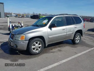 2002 GMC Envoy SLT z VIN 1GKDT13S122114452, wystawiony jako IAAI lot #42048616 z przebiegiem 259 545 mil mil oraz . Historia ofert i sprzedaży dostępna na DreamBid. Obrazek 2.