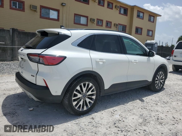 2020 Ford Escape Titanium Hybrid with VIN 1FMCU9DZ0LUB95931, listed as a Copart auction lot 59876815 with 67,932 mi miles and Salvage title. Bid and sale history available at DreamBid. Image 3.