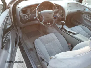 1995 Ford Thunderbird LX with VIN 1FALP62W3SH119037, listed as a Copart auction lot 41517485 with 164,133 mi miles and Salvage Title. Bid and sale history available at carsss.com. Image 8.