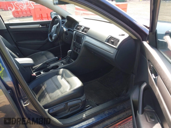 2015 Volkswagen Passat 1.8T Limited Edition with VIN 1VWAT7A33FC091945, listed as a IAAI auction lot 41930380 with 145,488 mi miles. Bid and sale history available at carsss.com. Image 5.