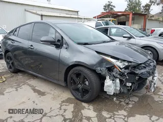 2016 Toyota Prius Four z VIN JTDKARFU8G3015083, wystawiony jako IAAI lot #42191765 z przebiegiem 168 820 mil mil oraz . Historia ofert i sprzedaży dostępna na DreamBid. Obrazek 1.
