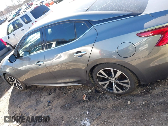 2018 Nissan Maxima SL z VIN 1N4AA6AP2JC387155, wystawiony jako IAAI lot #41642025 z przebiegiem 125 621 mil mil oraz . Historia ofert i sprzedaży dostępna na DreamBid. Obrazek 14.