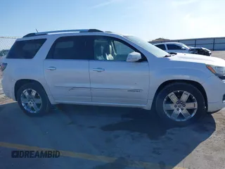 2016 GMC Acadia Denali with VIN 1GKKVTKD3GJ221449, listed as a IAAI auction lot 41777230 with 157,699 mi miles and . Bid and sale history available at DreamBid. Image 13.