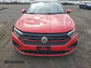 2019 Volkswagen Jetta GLI S z VIN 3VW5T7BU5KM148082, wystawiony jako Copart lot #56562505 z przebiegiem 100 026 mil mil oraz Szkody całkowita. Historia ofert i sprzedaży dostępna na DreamBid. Obrazek 5.