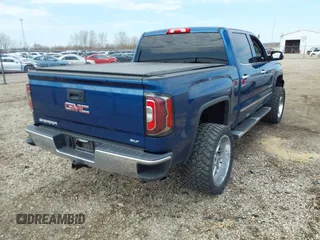 2016 GMC Sierra 1500 SLT with VIN 3GTU2NEC5GG246818, listed as a IAAI auction lot 41914533 with 122,298 mi miles and . Bid and sale history available at DreamBid. Image 4.