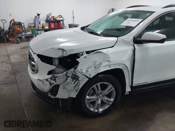 2021 GMC Terrain SLE with VIN 3GKALTEV0ML383940, listed as a IAAI auction lot 41544809 with 50,858 mi miles and . Bid and sale history available at carsss.com. Image 6.