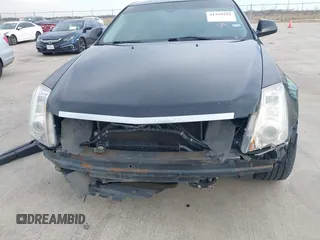 2013 Cadillac CTS Performance with VIN 1G6DJ5E37D0156897, listed as a IAAI auction lot 41359292 with 152,051 mi miles and . Bid and sale history available at DreamBid. Image 6.