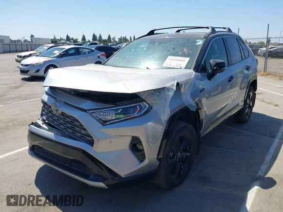 2021 Toyota RAV4 Hybrid XSE with VIN 4T3E6RFV6MU040399, listed as a IAAI auction lot 42020866 with 46,593 mi miles and . Bid and sale history available at DreamBid. Image 2.