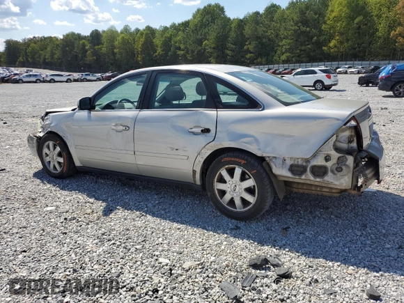 2006 Ford Five Hundred SE with VIN 1FAFP23186G104425, listed as a Copart auction lot 72427154 with 144,865 mi miles and Salvage Title. Bid and sale history available at carsss.com. Image 2.