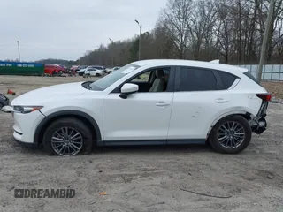 2017 Mazda CX-5 Touring with VIN JM3KFACL8H0205717, listed as a IAAI auction lot 41173725 with 107,604 mi miles. Bid and sale history available at carsss.com. Image 14.