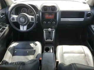 2016 Jeep Compass High Altitude Edition with VIN 1C4NJDEB6GD697021, listed as a Copart auction lot 54332755 with 104,611 mi miles and Salvage Title. Bid and sale history available at carsss.com. Image 8.
