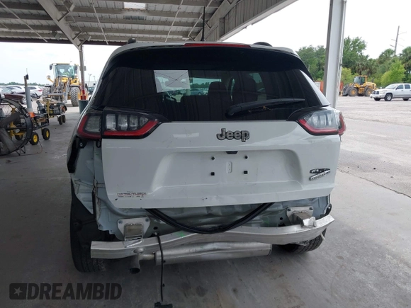 2022 Jeep Cherokee Latitude Lux z VIN 1C4PJLMXXND501689, wystawiony jako IAAI lot #42401720 z przebiegiem 34 037 mil mil oraz . Historia ofert i sprzedaży dostępna na DreamBid. Obrazek 17.