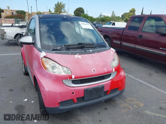 2009 Smart fortwo Pure z VIN WMEEJ31X59K245895, wystawiony jako IAAI lot #42266793 z przebiegiem 120 497 mil mil oraz . Historia ofert i sprzedaży dostępna na DreamBid. Obrazek 6.