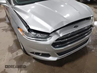 2014 Ford Fusion SE Hybrid with VIN 3FA6P0LU8ER183231, listed as a IAAI auction lot 41848377 with 130,496 mi miles. Bid and sale history available at carsss.com. Image 12.
