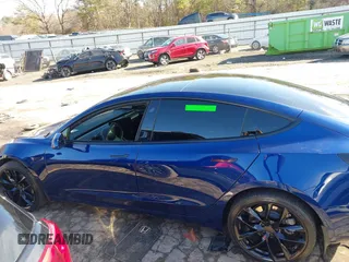 2023 Tesla Model 3 Long Range with VIN 5YJ3E1EB0PF688172, listed as a IAAI auction lot 41411580 with 21,125 mi miles and . Bid and sale history available at DreamBid. Image 14.