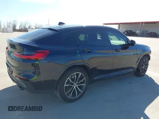 2021 BMW X4 xDrive30i z VIN 5UX2V1C06M9E42747, wystawiony jako IAAI lot #41661458 z przebiegiem 66 292 mil mil oraz . Historia ofert i sprzedaży dostępna na DreamBid. Obrazek 4.