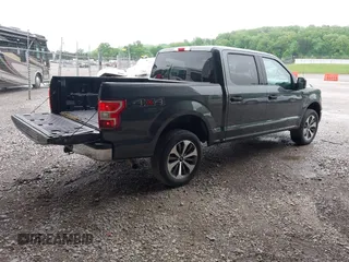 2018 Ford F-150 XL with VIN 1FTEW1EG4JKE17790, listed as a IAAI auction lot 42128519 with 153,740 mi miles. Bid and sale history available at carsss.com. Image 4.