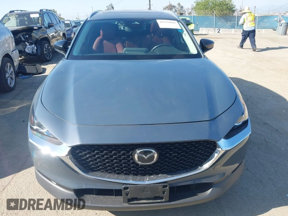 2024 Mazda CX-30 S Carbon Edition z VIN 3MVDMBCM3RM635044, wystawiony jako IAAI lot #41979849 z przebiegiem 15 717 mil mil oraz . Historia ofert i sprzedaży dostępna na DreamBid. Obrazek 13.