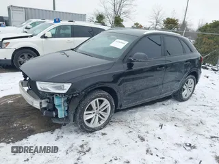 2017 Audi Q3 Premium with VIN WA1BCCFSXHR012345, listed as a IAAI auction lot 41589844 with 125,044 mi miles and . Bid and sale history available at DreamBid. Image 2.