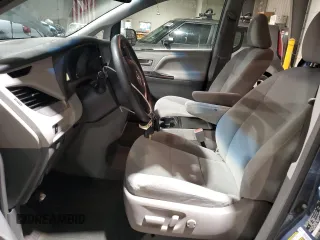 2016 Toyota Sienna LE with VIN 5TDJK3DC1GS130722, listed as a Copart auction lot 80244024 with 129,602 mi miles and Salvage Title. Bid and sale history available at carsss.com. Image 7.
