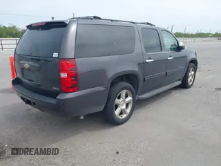 2011 Chevrolet Suburban LT with VIN 1GNSCJE03BR255374, listed as a IAAI auction lot 41909327 with 279,698 mi miles. Bid and sale history available at carsss.com. Image 4.