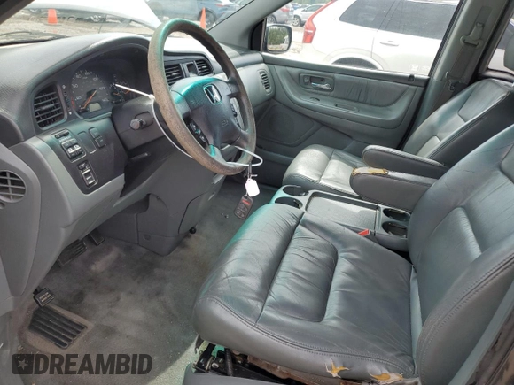2003 Honda Odyssey EX-L with VIN 5FNRL18933B116127, listed as a Copart auction lot 56013645 with 157,118 mi miles and Salvage Title. Bid and sale history available at DreamBid. Image 7.