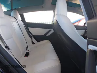2020 Tesla Model 3 Standard Range Plus with VIN 5YJ3E1EA8LF661982, listed as a IAAI auction lot 41700109 with 30,271 mi miles and . Bid and sale history available at DreamBid. Image 8.