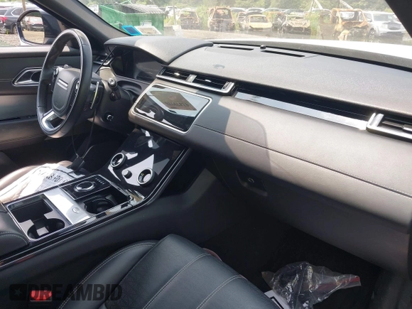2020 Land Rover Range Rover Velar z VIN SALYM2EV8LA274870, wystawiony jako IAAI lot #42479938 z przebiegiem 43 039 mil mil oraz . Historia ofert i sprzedaży dostępna na DreamBid. Obrazek 5.
