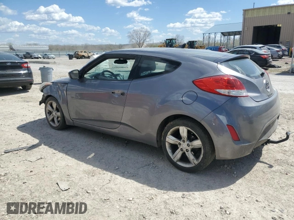 2014 Hyundai Veloster z VIN KMHTC6AD3EU215750, wystawiony jako Copart lot #52769165 z przebiegiem 114 364 mil mil oraz Szkoda całkowita • Salvage title. Historia ofert i sprzedaży dostępna na DreamBid. Obrazek 2.