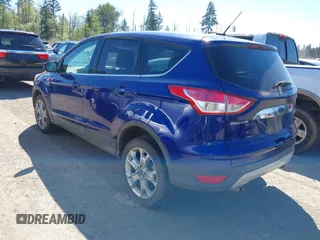 2013 Ford Escape SEL with VIN 1FMCU9HX3DUB97778, listed as a IAAI auction lot 42195445 with 147,154 mi miles. Bid and sale history available at carsss.com. Image 3.