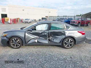 2016 Nissan Altima SR with VIN 1N4AL3AP2GC220196, listed as a IAAI auction lot 42362704 with 104,939 mi miles and . Bid and sale history available at DreamBid. Image 14.