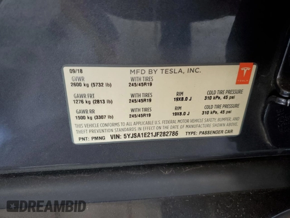 2018 Tesla Model S 75D with VIN 5YJSA1E21JF282786, listed as a Copart auction lot 58058595 with 65,982 mi miles and Salvage title. Bid and sale history available at DreamBid. Image 12.