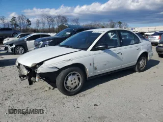 1996 Saturn SL with VIN 1G8ZK5279TZ162812, listed as a Copart auction lot 87079874 with 143,461 mi miles and Salvage Title. Bid and sale history available at carsss.com. Image 1.